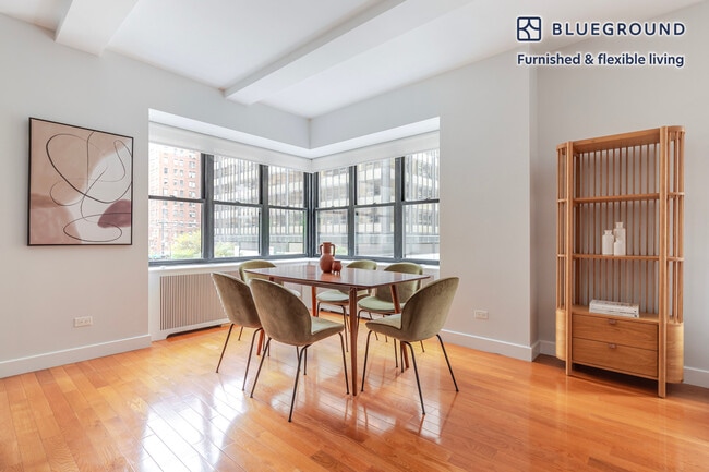 Building Photo - 400 E 57th St