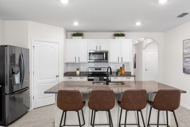 Foto del edificio - 4BR Under $2,300/mo | Tesla Charger | 15 Min to Lake Nona