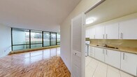 This 690 square foot apartment in Mississauga offers a thoughtful layout with 2 bedrooms and 1 bathroom. The space is characterized by its bright and airy atmosphere, enhanced by large windows that flood the rooms with natural light. The living area boasts beautiful parquet flooring, creating a warm and inviting ambiance.

The kitchen is modern and functional, featuring white cabinetry, a full-sized refrigerator, and a stove. Tile flooring in the kitchen area provides easy maintenance. The bathroom is clean and simple, with a white suite and a shower/tub combination.

A standout feature is the balcony, which offers scenic views of the surrounding landscape, including trees and open green spaces. This outdoor space provides a perfect spot for relaxation or enjoying fresh air.

The bedrooms are well-proportioned, with the primary bedroom measuring 130 square feet. Built-in closets offer ample storage space. The apartment's layout maximizes the use of space, making it feel larger than its actual square footage.

Overall, this apartment combines modern conveniences with a bright, open feel, making it an ideal urban living space. Its location at 3400 Riverspray Crescent in Mississauga adds to its appeal, offering residents a comfortable home in a desirable area.