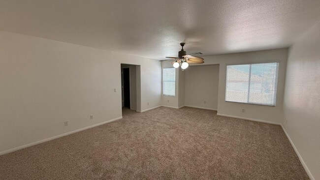 Building Photo - New flooring and freshly painted 4 bedroom home