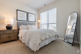 3BR, 2BA - 1,245SF - Primary Bedroom - Seasons at Hoffman Estates