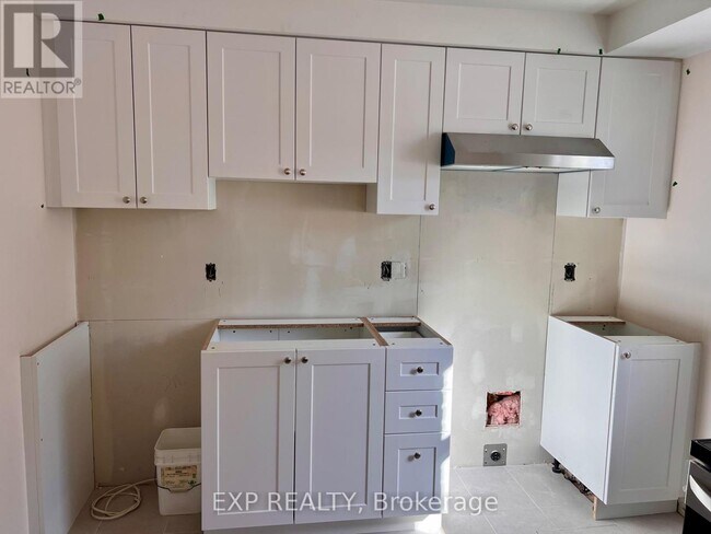 Photo du bâtiment - 75 Holland Ave