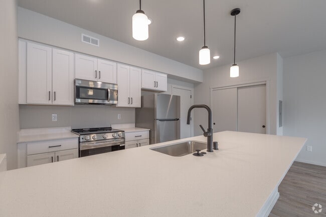 Building Photo - Stunning 1, 2, and 3 Bedroom Apartment Hom...