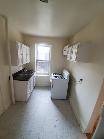 Building Photo - 37-76 62nd Street Unit