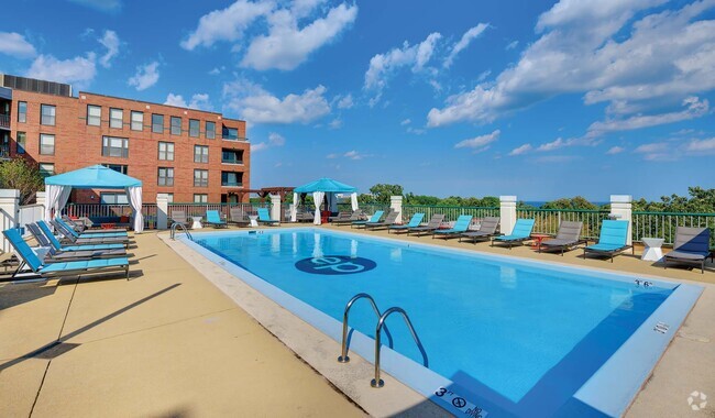 Catch some sun on the pool deck - Evanston Place