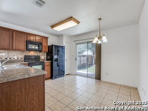 Foto del edificio - 9007 Oakwood Garden