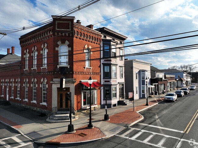 Residents have easy access to local shops and parks on Broadway.