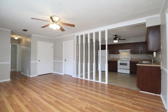 Building Photo - Spacious Bellview 2BR/1.5BA Duplex with Large New Front Deck, Fenced Backyard & Covered 2-Car Car...