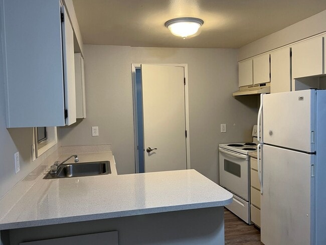 Building Photo - NEWLY REFRESHED Two Bedroom Townhome Style...