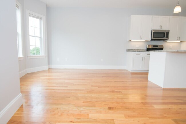 Building Photo - One month FREE! Pristine unit in a great A...
