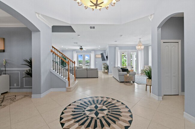 Building Photo - OCEAN ACCESS !! 6 BR 4.5 BA 2 CG pool home rental in Port St Lucie FL