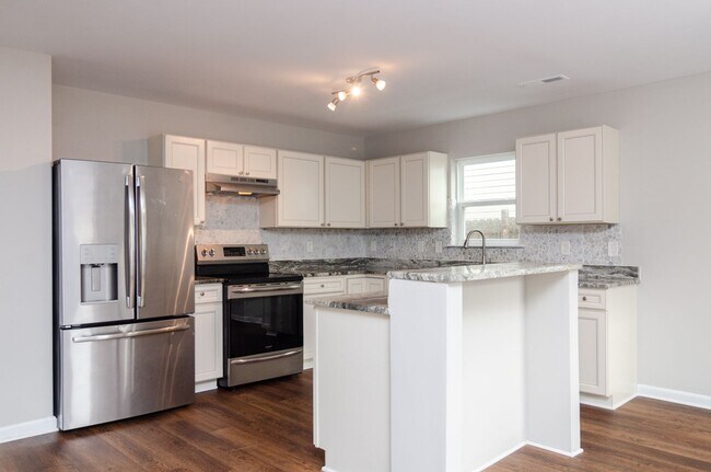 Foto del edificio - 6516 Rustling Leaves Way