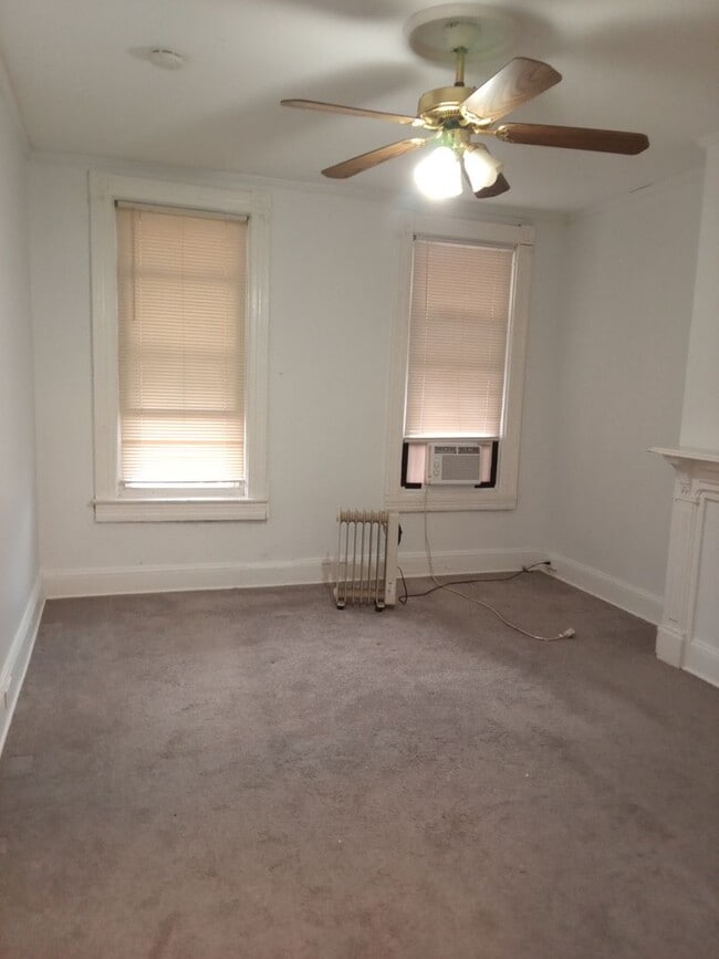 Building Photo - Quiet block, cozy home with extra touches