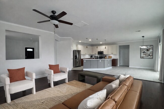 Sala familiar abierta a la cocina y al comedor. - 429 Indigo Ridge Dr