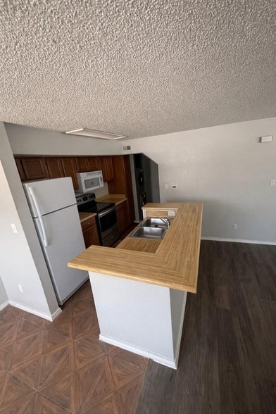 Photo - 9823 Walnut Street Unit L205 Apartment