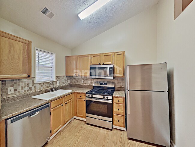 Foto del edificio - 4046 River Rock Way