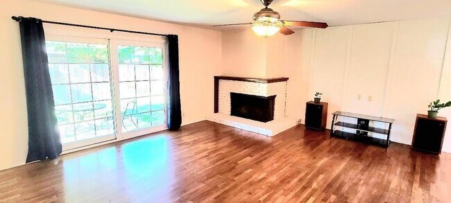 Fireplace and hardwood floors - 3793 E Saginaw Way