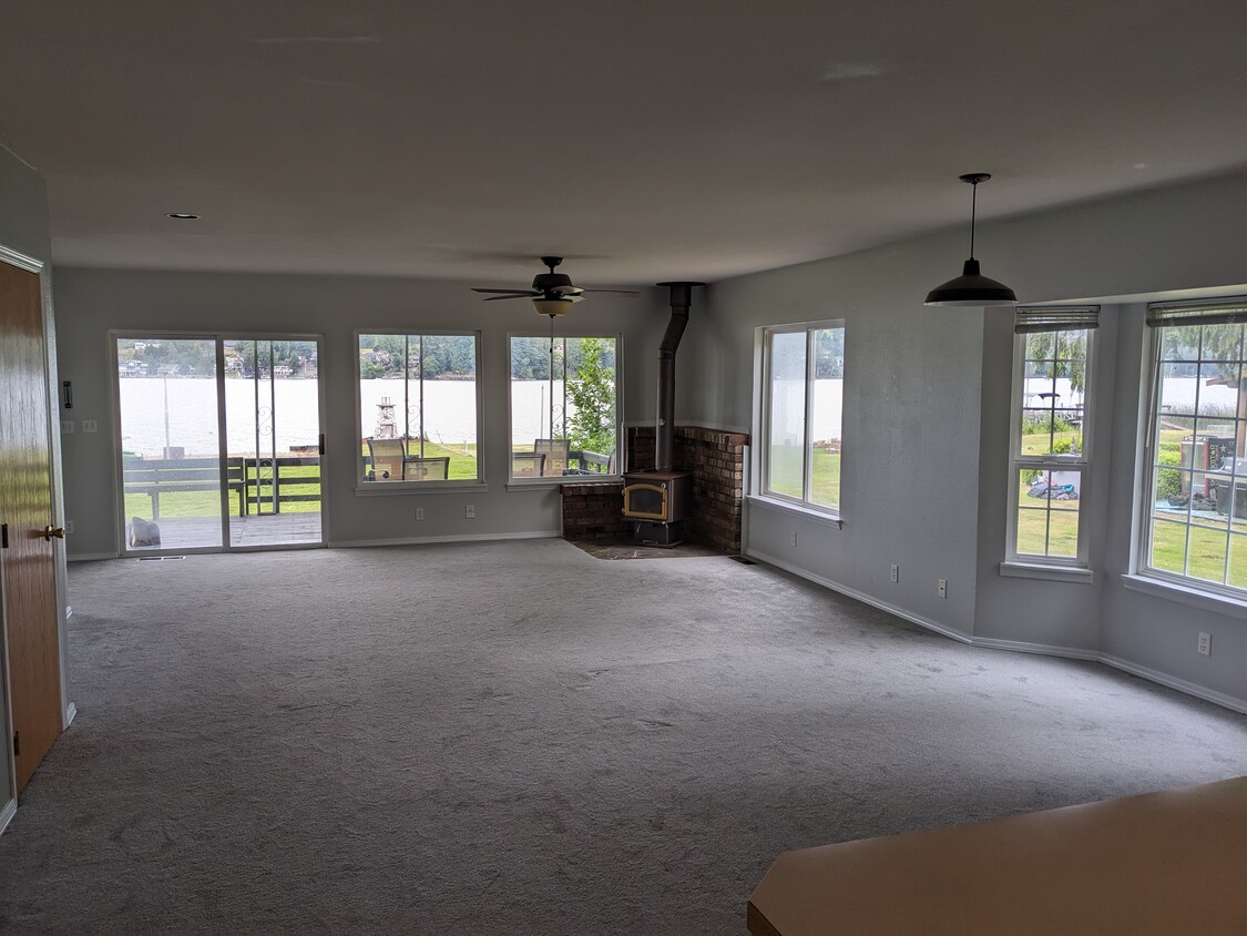 Dining and living room with view of the lake - 17719 W Big Lake Blvd
