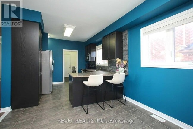 Photo du bâtiment - 825 Black Cherry Dr