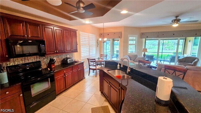 Building Photo - 10637 Pelican Preserve Blvd