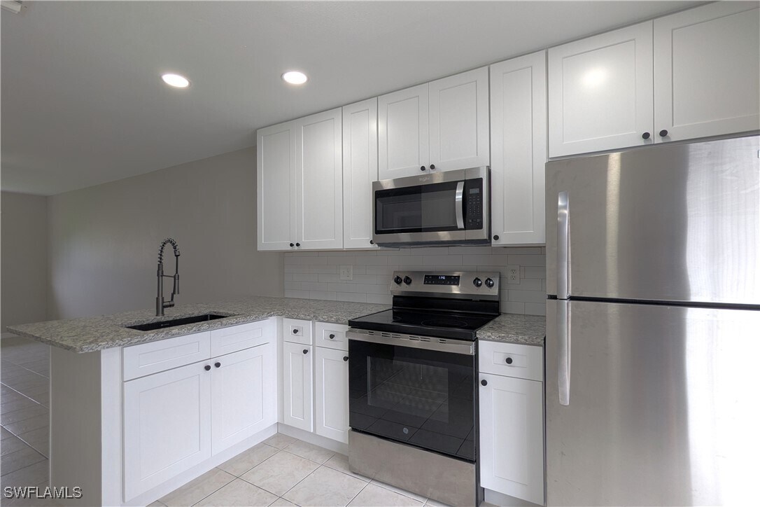Foto principal - 427 NE Pine Island Ln