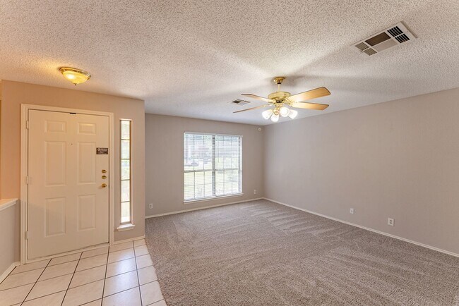 Building Photo - Charming Sunlit 3-Bedroom Home with Spacio...