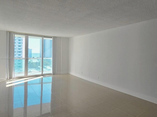 Building Photo - 19380 Collins Ave