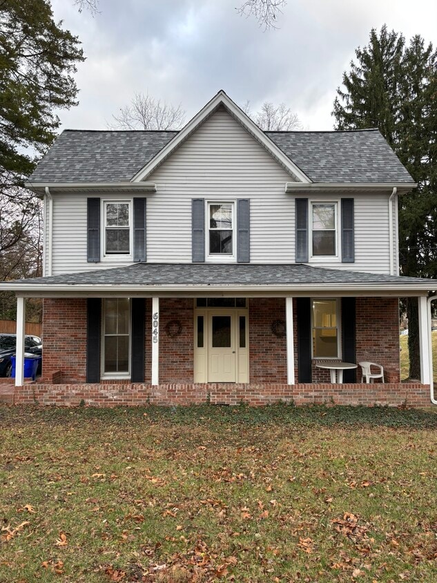 Front view. Apartment 1 is in the first floor to the left - 6045 Old Washington Rd