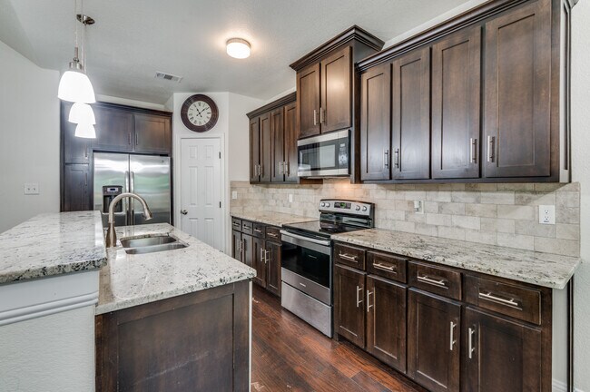 Updated Kitchen with stainless steal appliances - 3032 James Ave