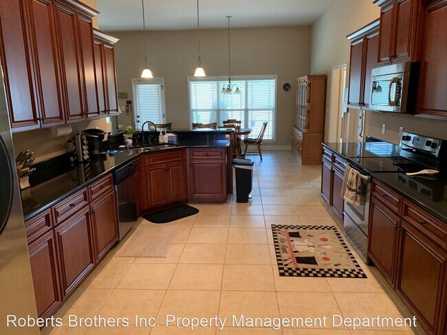 Building Photo - 4 br, 3 bath House - 7301 Morse Loop