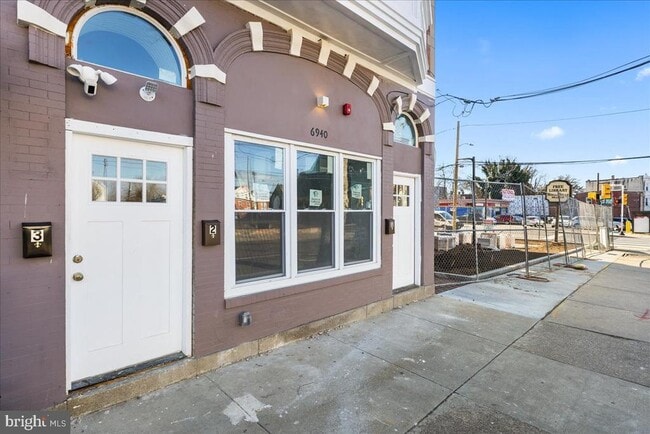 Building Photo - 6940 Woodland Ave