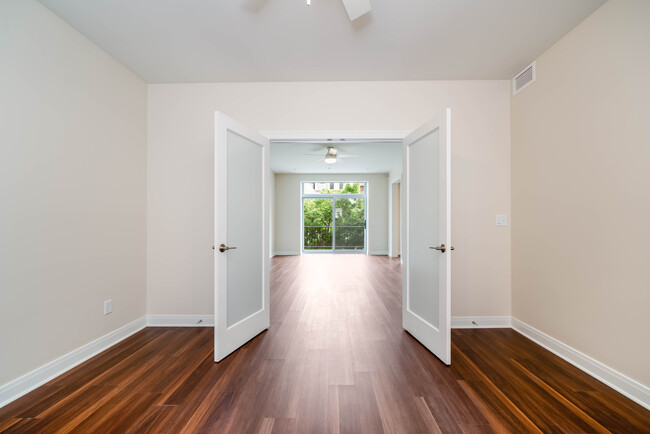 201 secondary bedroom looking into living room - Peregrine Square