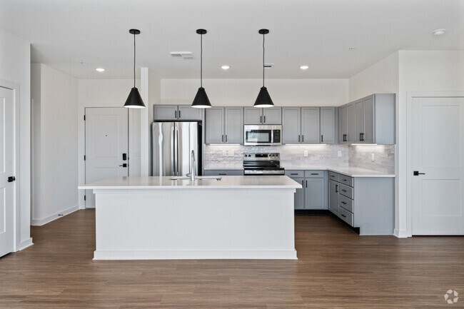 2 habitaciones, 2 baños - 1.032 pies cuadrados - Cocina - West Row Lofts & Townhomes
