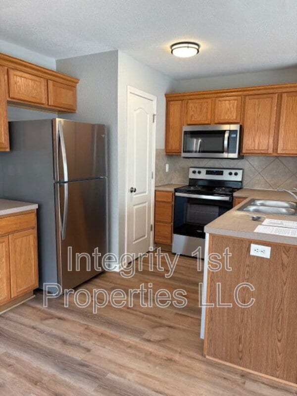 Foto del edificio - 8880 N Helena Ave