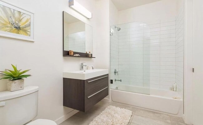 Building Photo - Roof Top Deck, High Ceiling with New Appli...