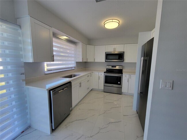 Building Photo - 3413 Port Charlotte Blvd