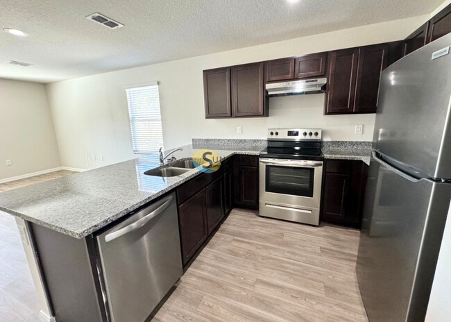 Foto del edificio - 6408 Sweetbay Ln