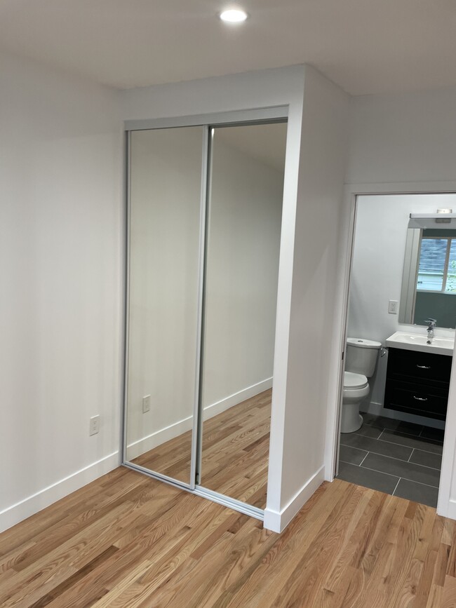 Sliding mirror closet doors - 818 N Van Ness Ave