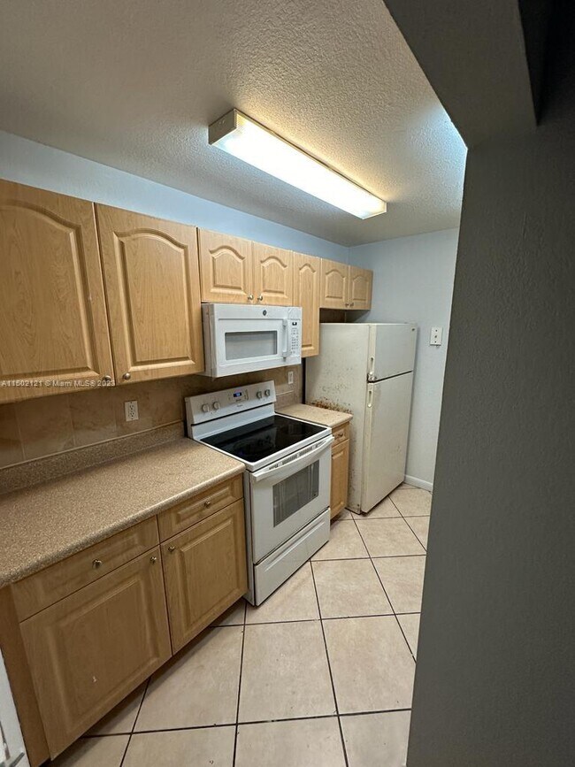 Building Photo - 2874 NW 55th Ave