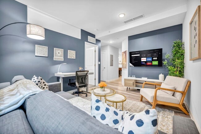1BR, 1BA - 587SF - Living Room - The Athlon