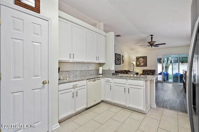 Building Photo - 4 br, 2 bath House - 850 S Lilac Loop