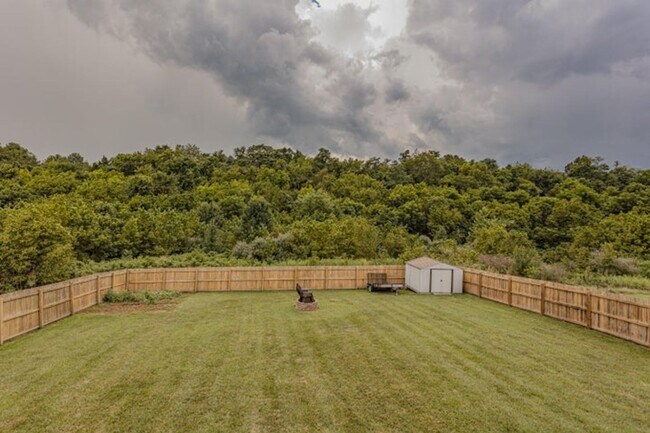 Building Photo - 4BR, 2.5 Ba home in the Saddlebrook Ridge ...