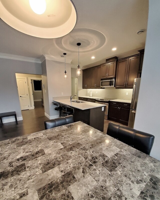 Photo du bâtiment - 915 10 St