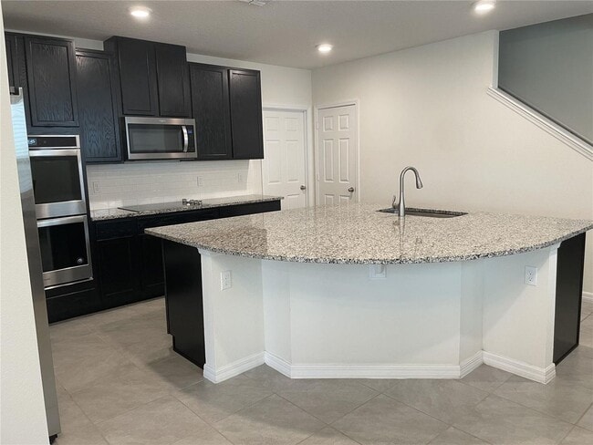 Foto del edificio - Like New Spacious Home near Lake Nona