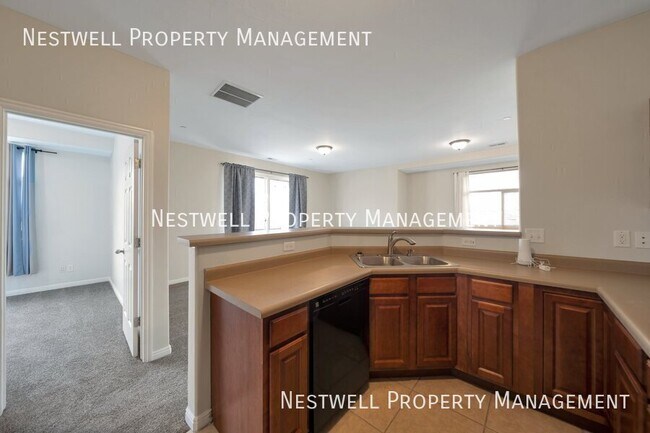 Building Photo - Cute 2-bed Condo in Vibrant Daybreak!