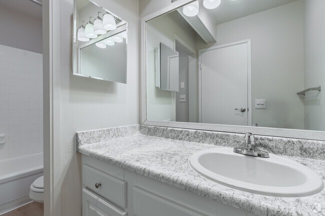 3BR, 1.5BA - 1,130SF - Bathroom - Trailwood Apartment Homes