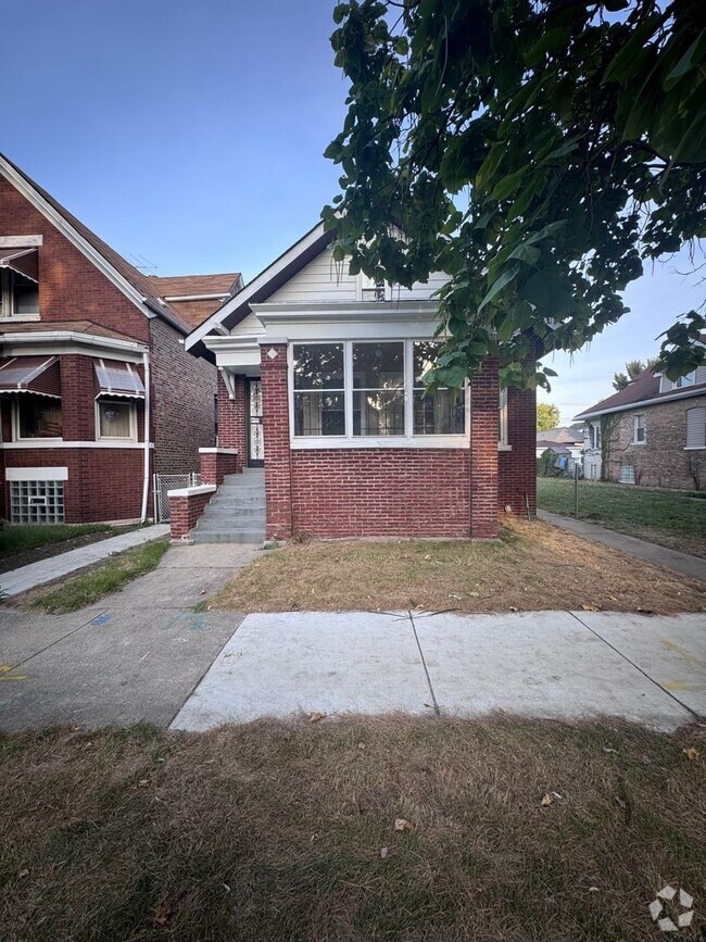 Building Photo - 7615 S Vernon Ave
