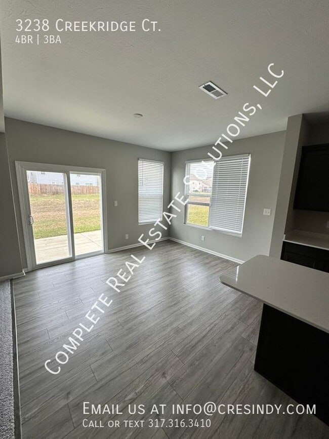 Building Photo - Now Showing this 4 BR, 2 1/2 BA home locat...