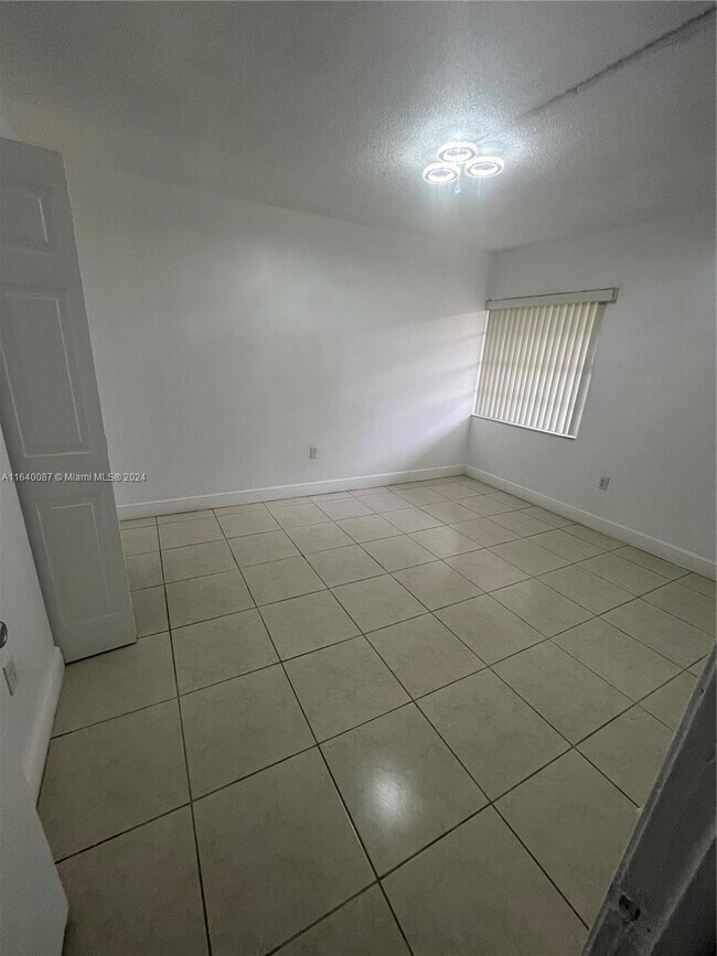 Building Photo - 9370 W Flagler St