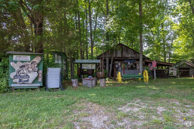 Log cabins are displayed at the Campbell Country Log Cabin Museum in Alexandria.